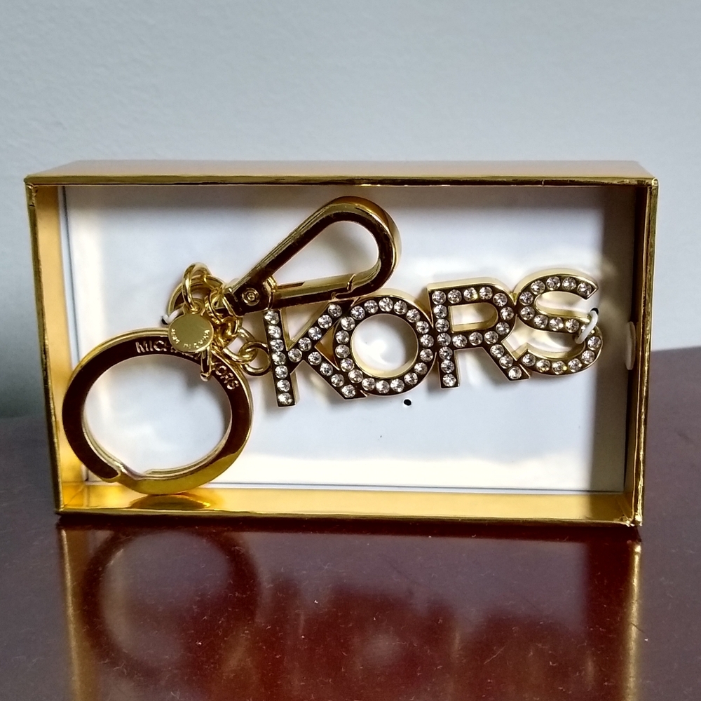 Micheal kors metal charm